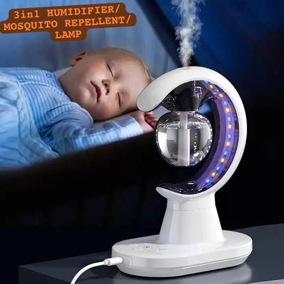 Mosquito repellent humidifier lamp on a bedside table